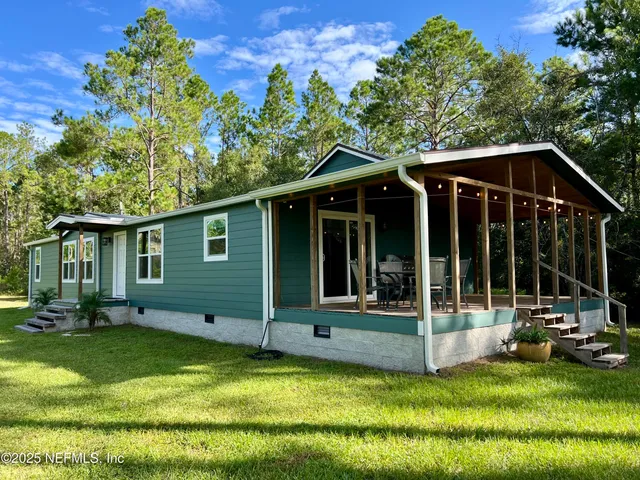 a view of a garden with a bench