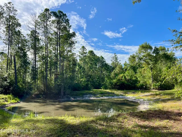 a kitchen with stainless steel appliances granite countertop a stove and a refrigerator
