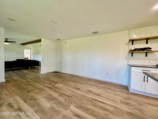 a bathroom with 2 sink and a mirror