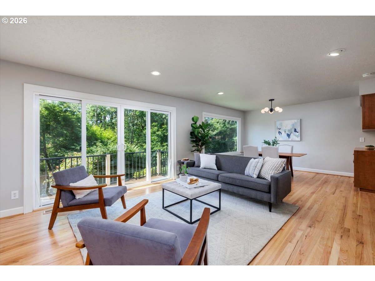 175 Northwest 95th Avenue Portland, OR 97229 - Photo 6 of 46 a living room with furniture and a large window