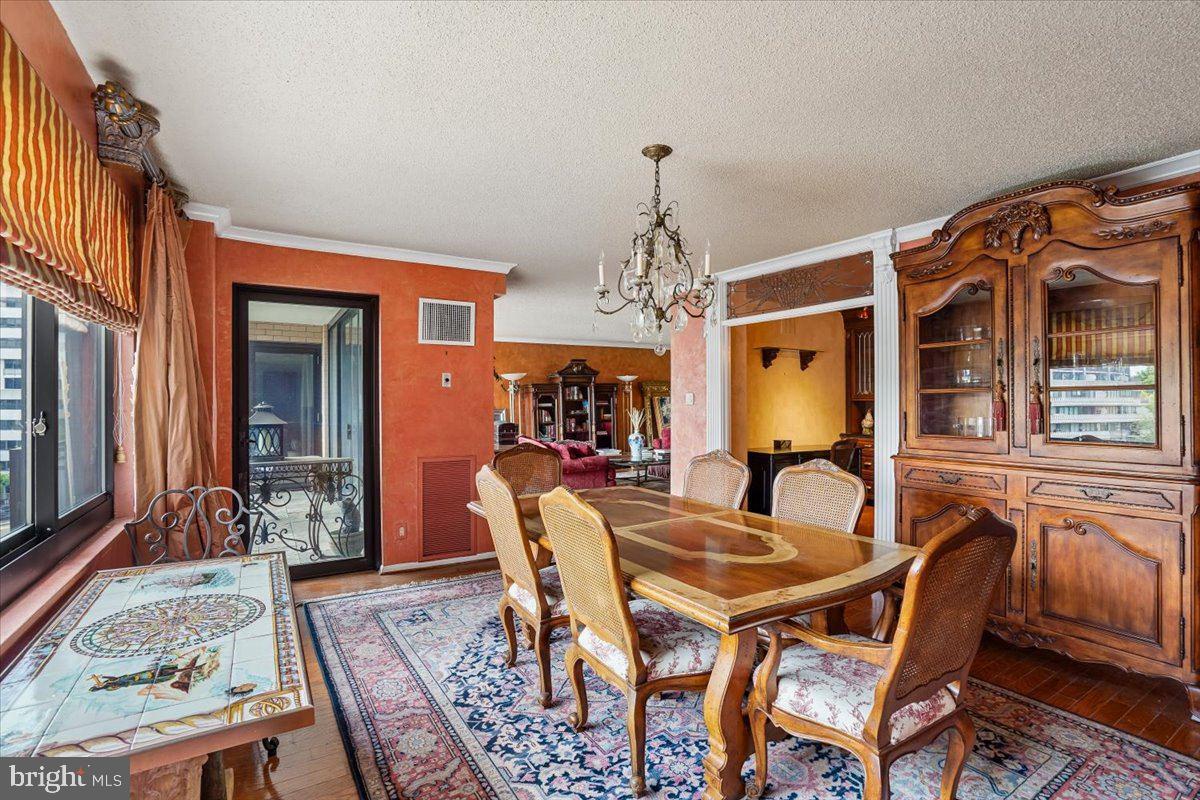 800 25th Street Northwest, Unit 504 Washington, DC 20037 - Photo 13 of 52 Elegant dining space with vintage charm.
