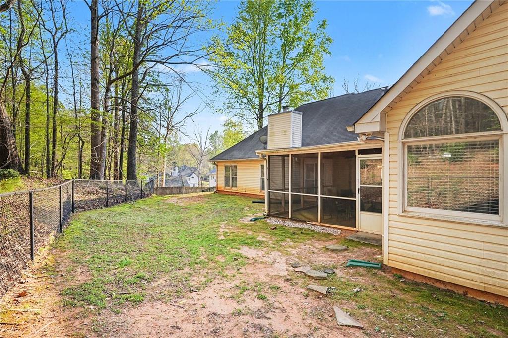 570 Morgan Court Hampton, GA 30228 - Photo 29 of 31 a house with trees in the background