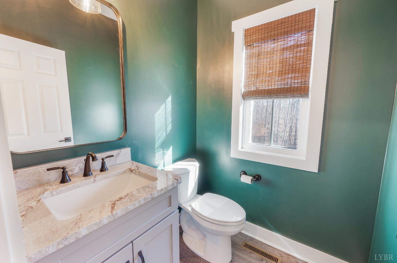 144 Armistead Lane Rustburg, VA 24588 - Photo 18 of 64 a bathroom with a granite countertop toilet sink and mirror