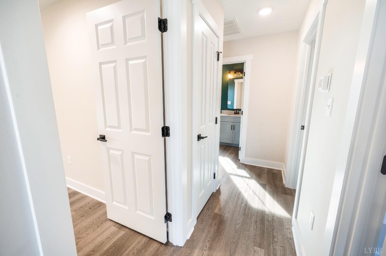144 Armistead Lane Rustburg, VA 24588 - Photo 20 of 64 a view of a bathroom from a hallway