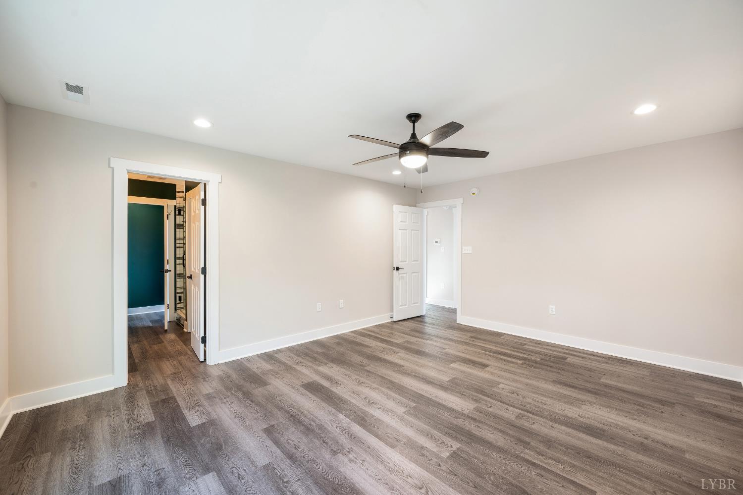 144 Armistead Lane Rustburg, VA 24588 - Photo 22 of 64 a view of an empty room with wooden floor
