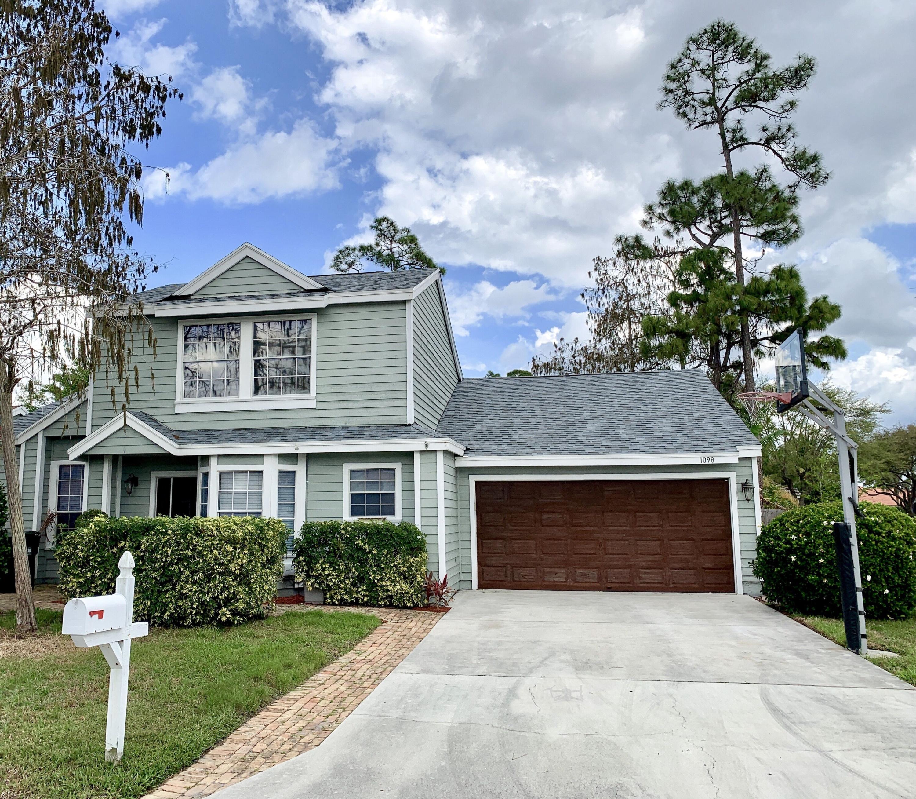 1098 Aviary Road Wellington, FL 33414 - Photo 1 of 37 Front