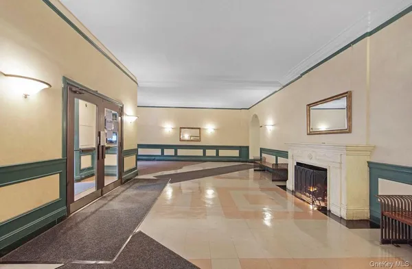a view of a living room and kitchen