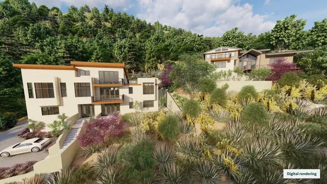 a aerial view of a house with a yard