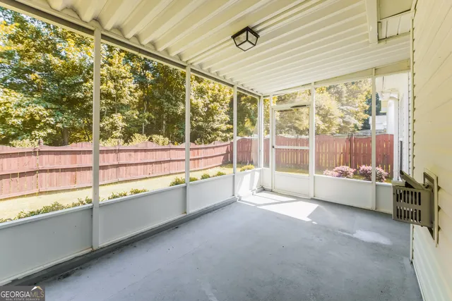 a bathroom with a large tub and shower
