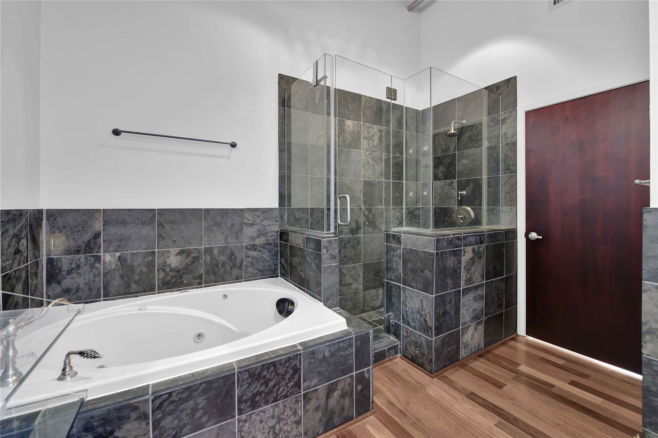 711 Main Street, Unit PH 1003 Houston, TX 77002 - Photo 12 of 32 Primary Bathroom with jetted tub and oversized shower.