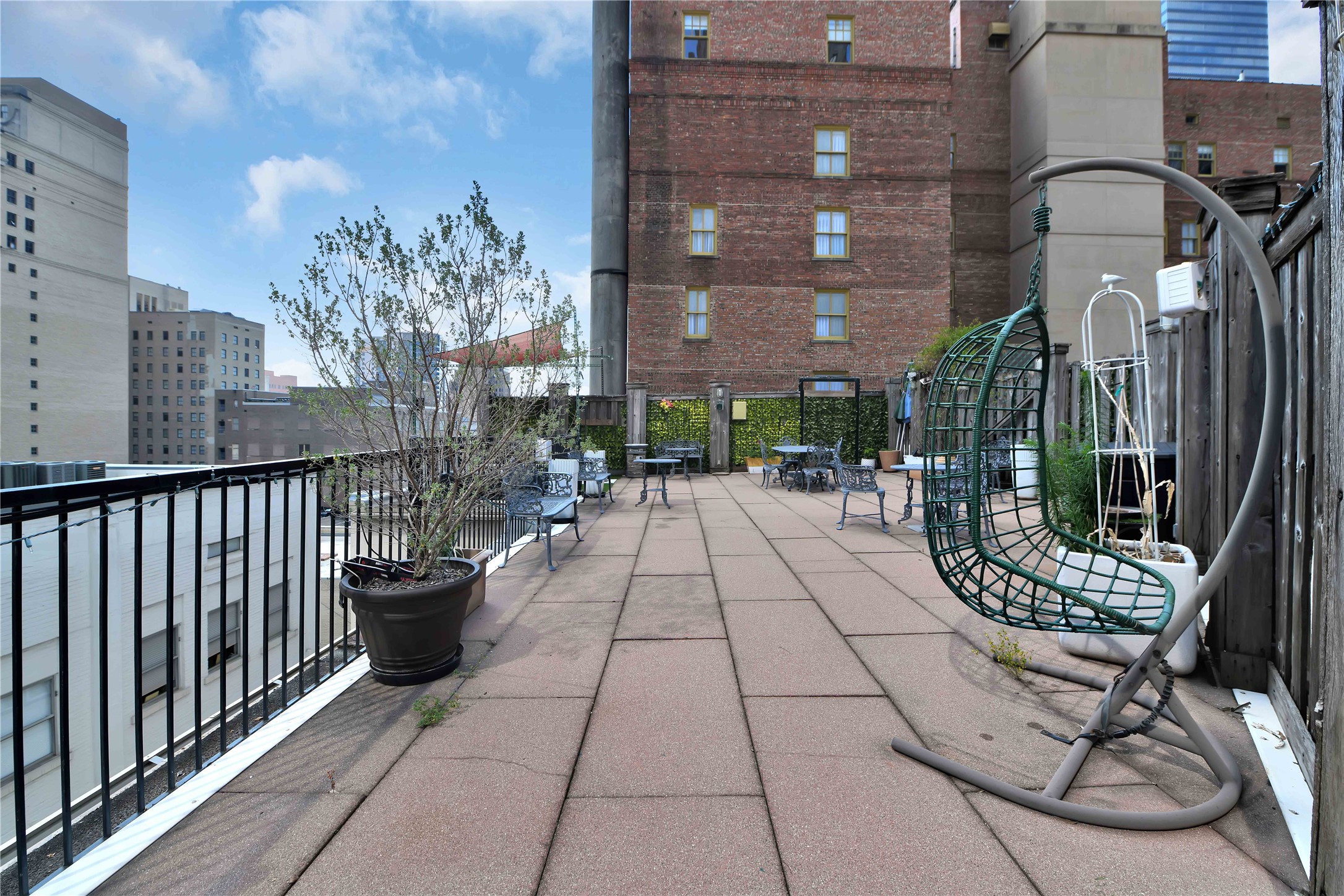 711 Main Street, Unit PH 1003 Houston, TX 77002 - Photo 27 of 32 Huge private outdoor space on the rooftop. Access from unit via teak spiral staircase.