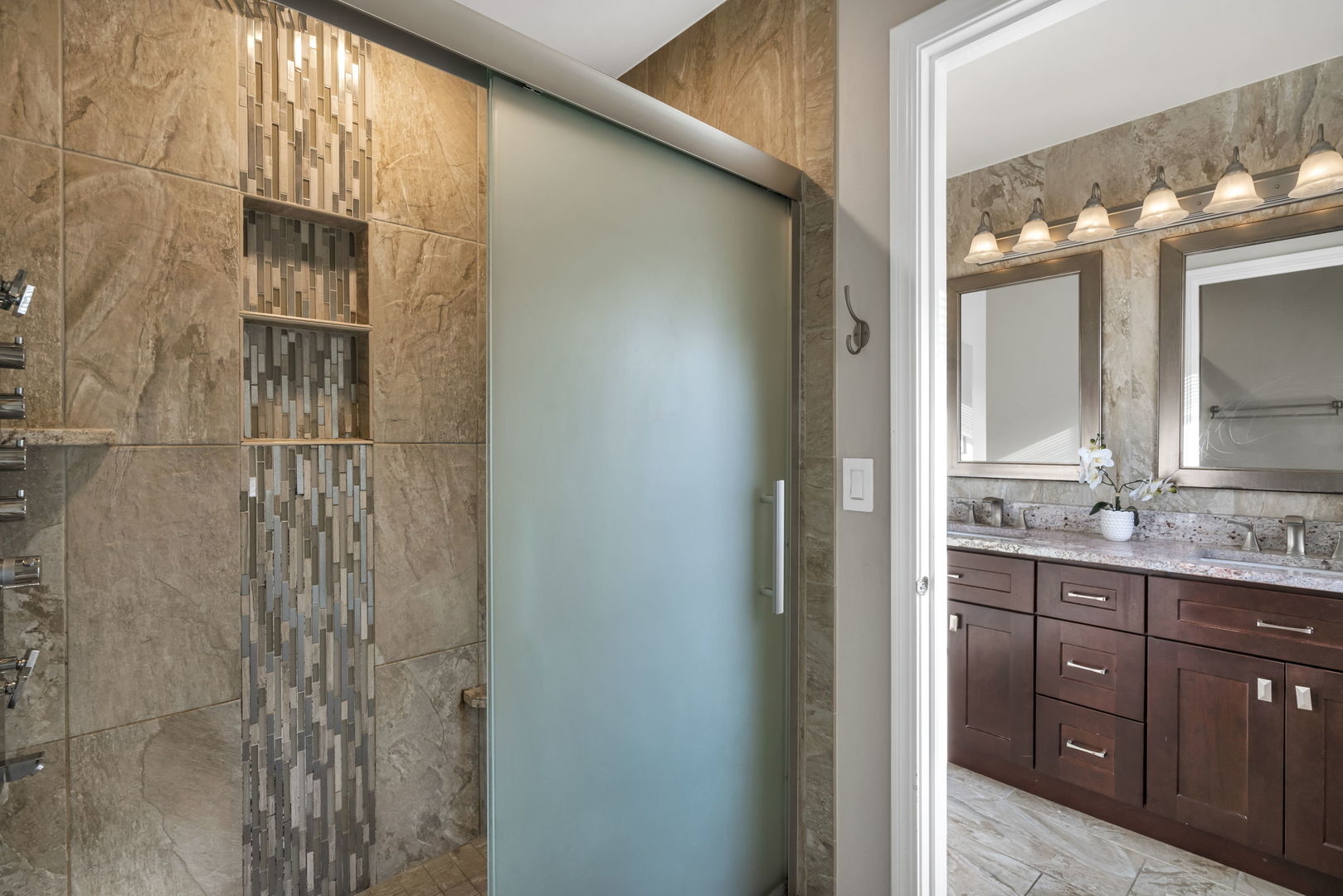 2241 Avalon Court South Buffalo Grove, IL 60089 - Photo 17 of 25 a bathroom with a double vanity sink a toilet and a mirror