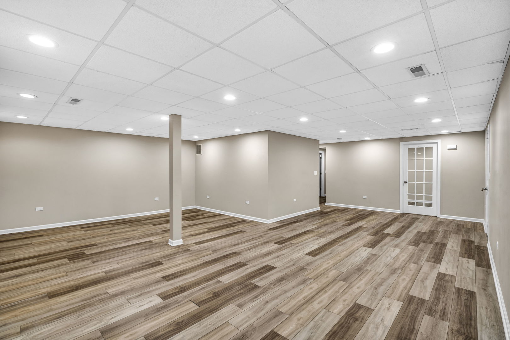 2241 Avalon Court South Buffalo Grove, IL 60089 - Photo 18 of 25 a view of an empty room with wooden floor