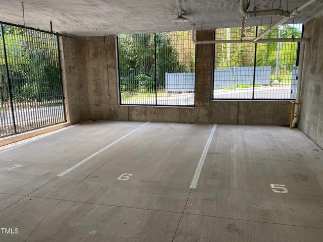a view of a swimming pool with a backyard