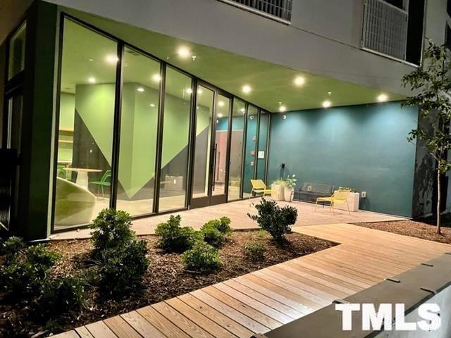 600 South Duke Street, Unit 15 Durham, NC 27701 - Photo 2 of 20 a view of a lobby with black carpet