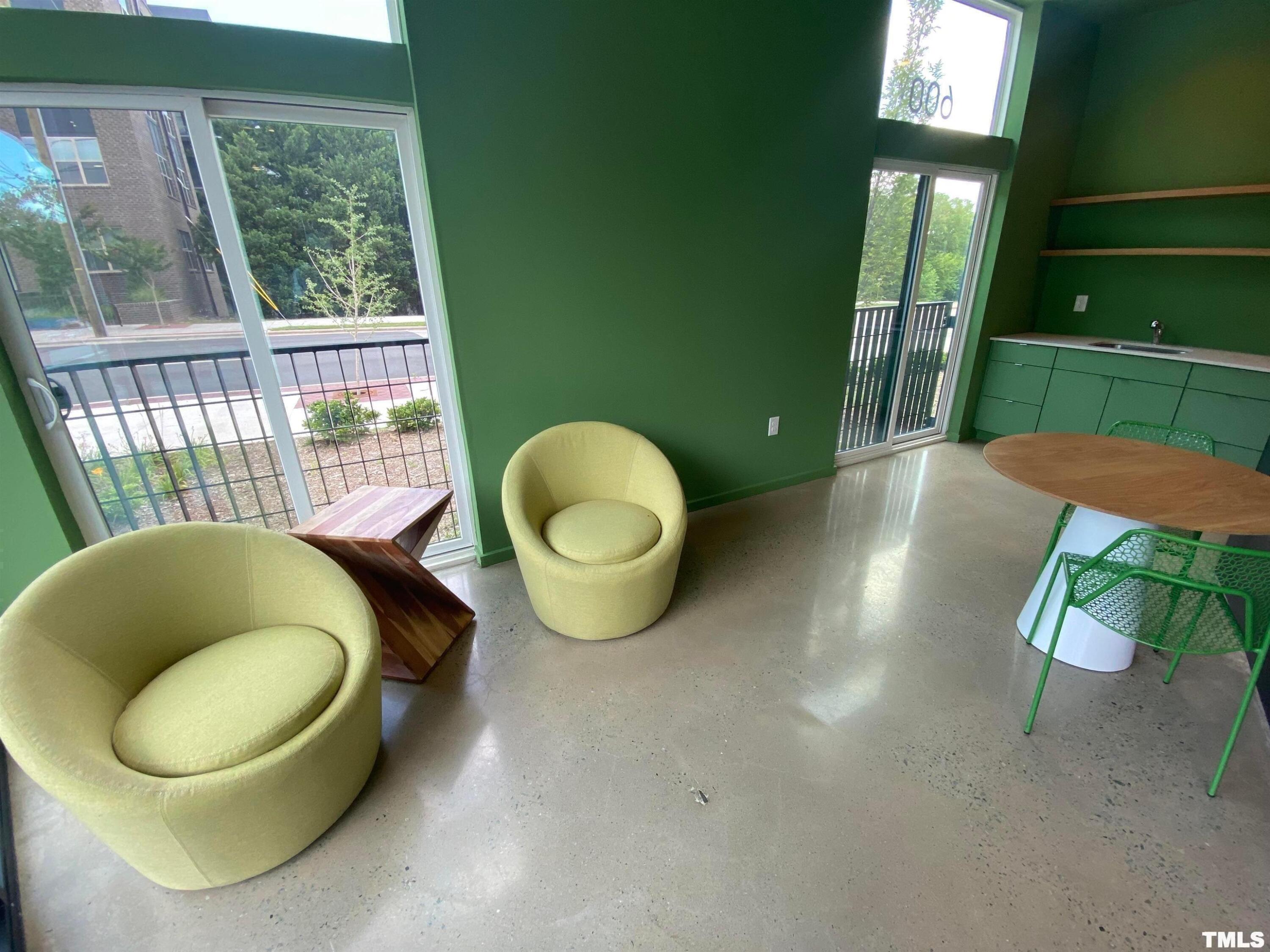 600 South Duke Street, Unit 15 Durham, NC 27701 - Photo 3 of 20 a living room with furniture and a large window