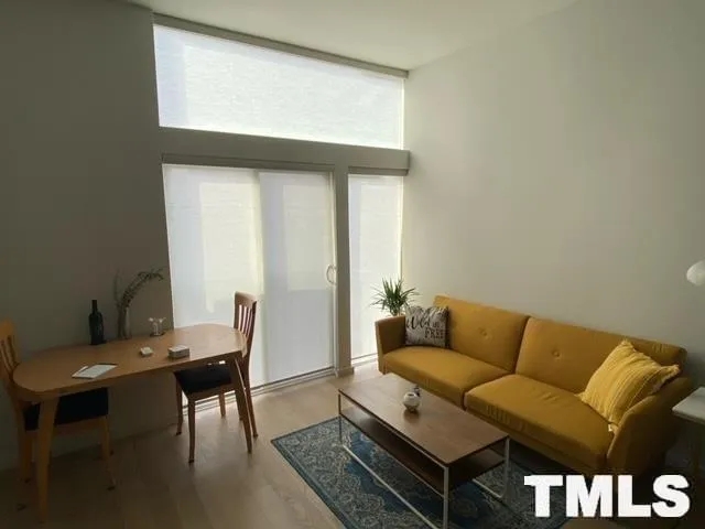a view of a storage and utility room with a washing machine in a room