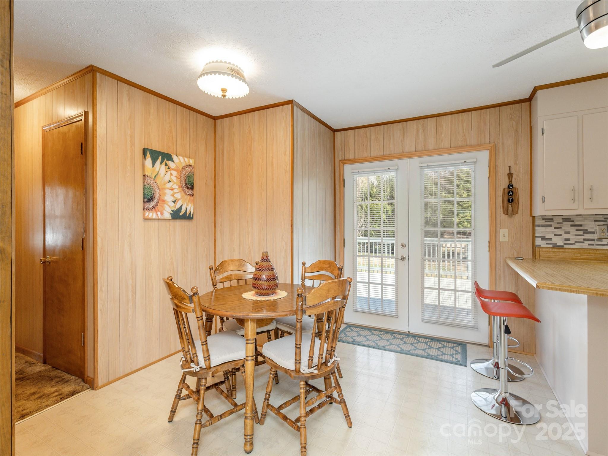 3021 Kanuga Road Hendersonville, NC 28739 - Photo 6 of 24 a dining room with furniture and window