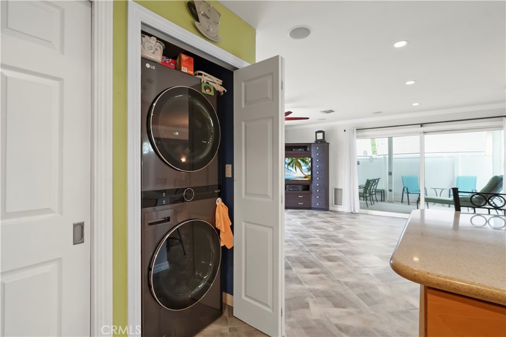 17068 Celtic Street Granada Hills, CA 91344 - Photo 15 of 21 a view of a hallway with washer and dryer