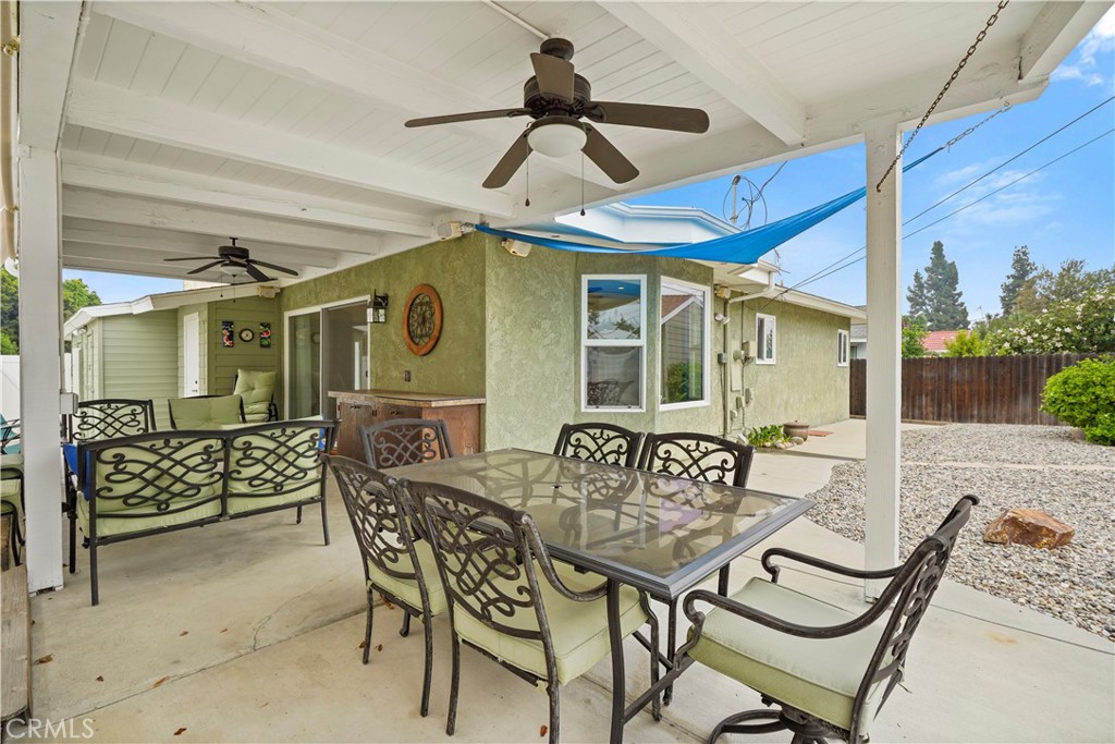 17068 Celtic Street Granada Hills, CA 91344 - Photo 17 of 21 a view of an outdoor dining space with a table and chairs