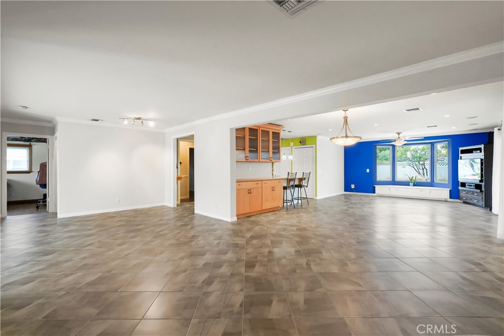 17068 Celtic Street Granada Hills, CA 91344 - Photo 5 of 21 a view of an empty room with window and wooden floor