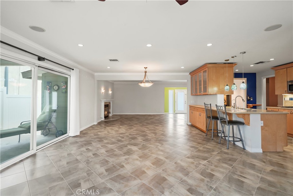 17068 Celtic Street Granada Hills, CA 91344 - Photo 6 of 21 a view of kitchen with kitchen island a sink a counter top space and appliances