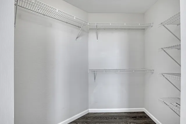 a view of a room with racks on the wall