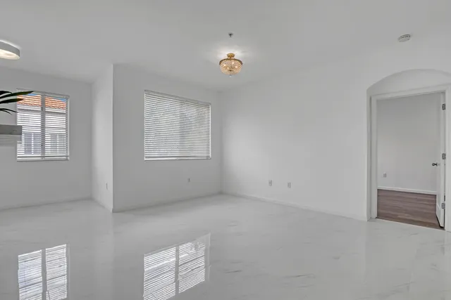 an empty room with windows
