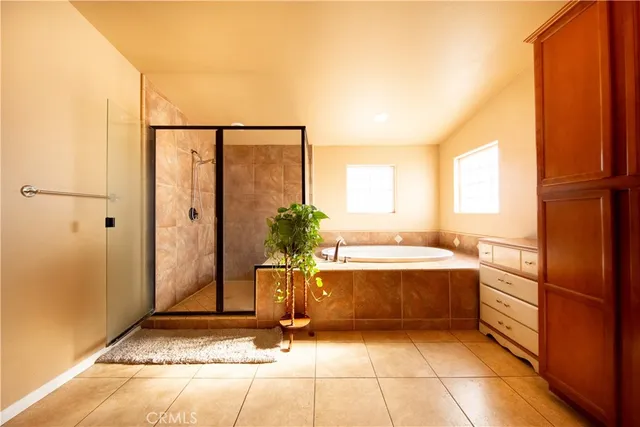 a view of a kitchen with kitchen island and living room