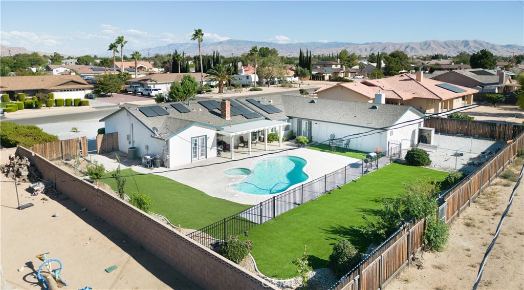 14024 Delaware Road Apple Valley, CA 92307 - Photo 38 of 41 an aerial view of residential houses with outdoor space and trees