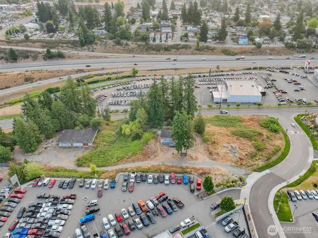 an aerial view of a swimming pool and outdoor space