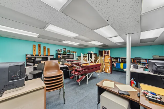 a gym room with furniture