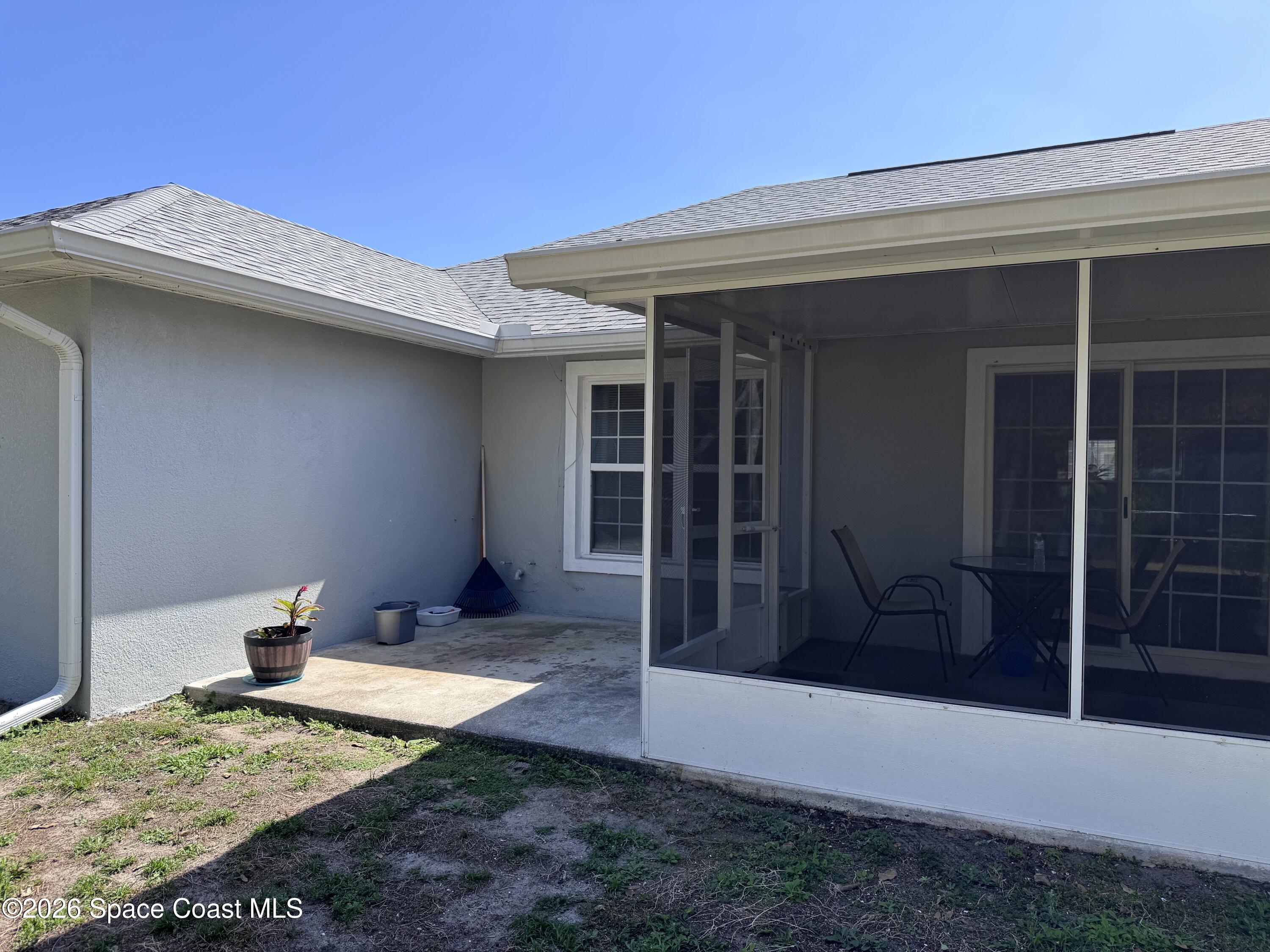 2595 3rd Avenue Northeast Palm Bay, FL 32905 - Photo 16 of 17 a view of a house with a tub