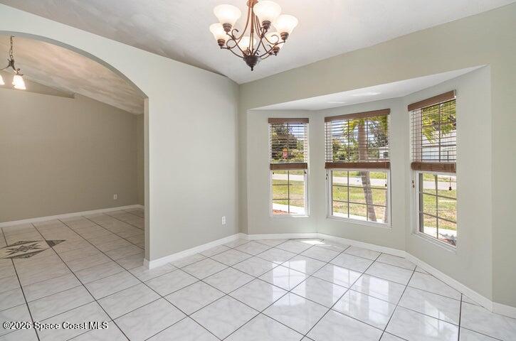 2595 3rd Avenue Northeast Palm Bay, FL 32905 - Photo 4 of 17 a view of an empty room with a window