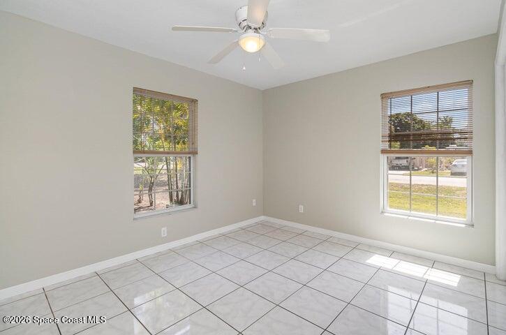 2595 3rd Avenue Northeast Palm Bay, FL 32905 - Photo 9 of 17 a view of an empty room with a window