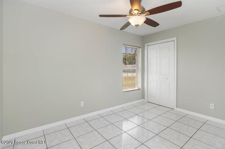 2595 3rd Avenue Northeast Palm Bay, FL 32905 - Photo 10 of 17 a view of an empty room and window