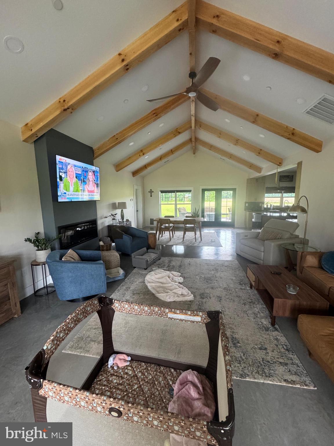 26067 Goldsboro Road Goldsboro, MD 21636 - Photo 12 of 21 a living room with furniture and a flat screen tv