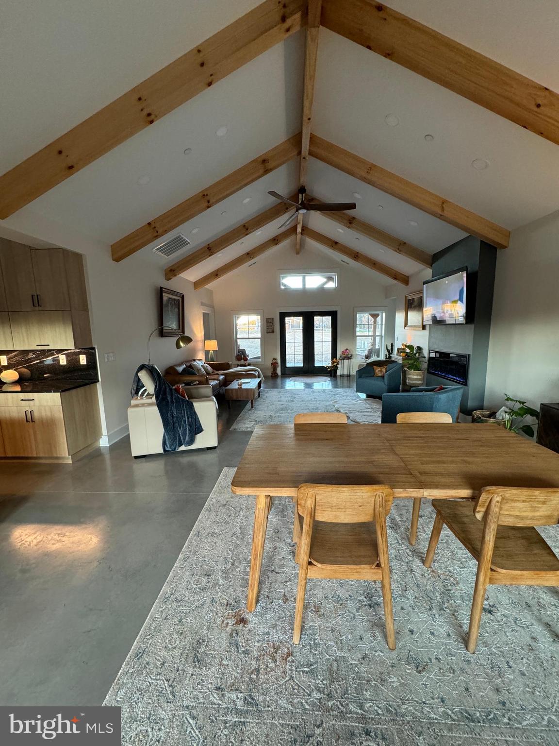 26067 Goldsboro Road Goldsboro, MD 21636 - Photo 14 of 21 a living room with lots of furniture and a clock