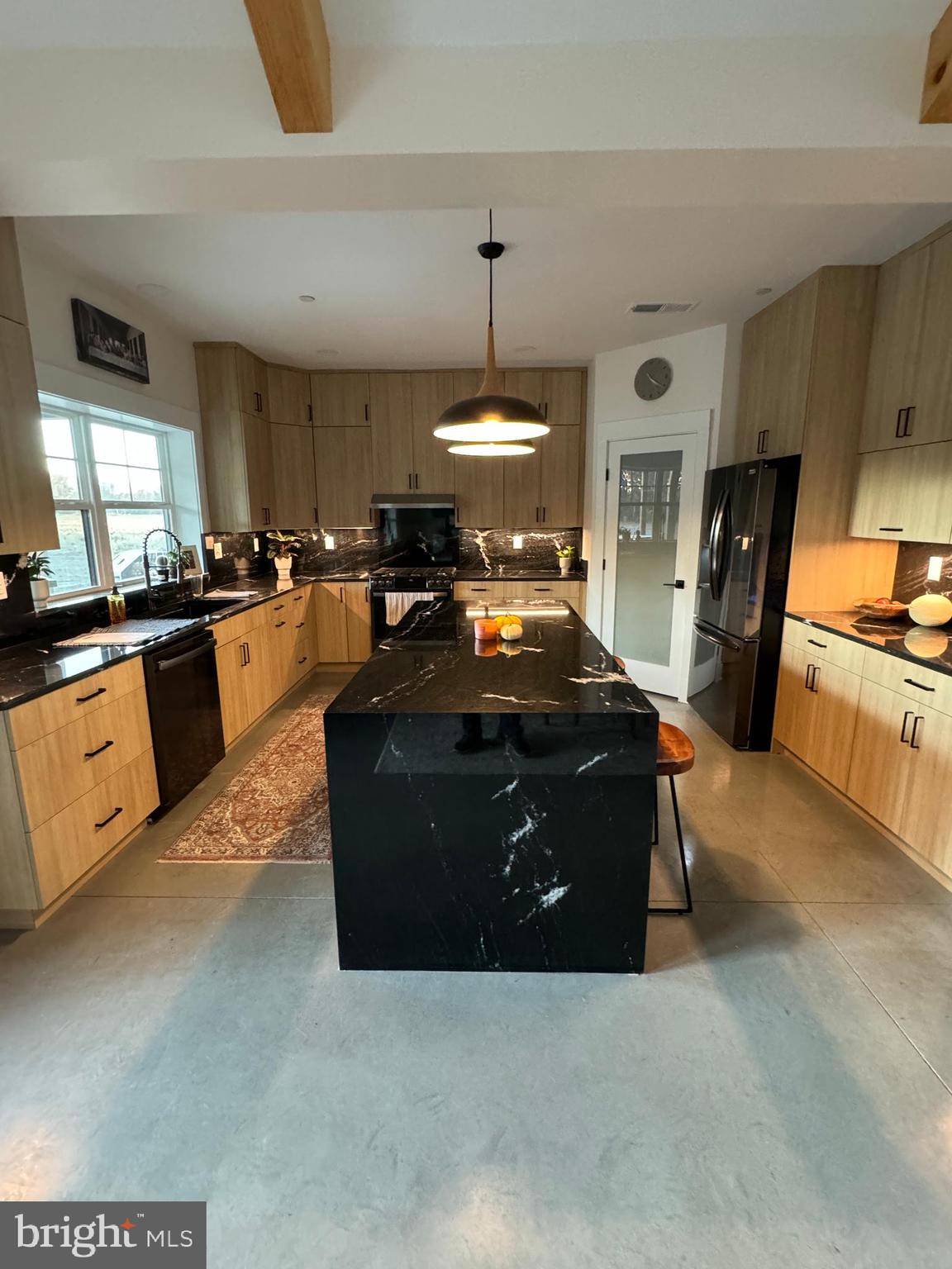 26067 Goldsboro Road Goldsboro, MD 21636 - Photo 15 of 21 a kitchen with stainless steel appliances granite countertop a stove and a refrigerator