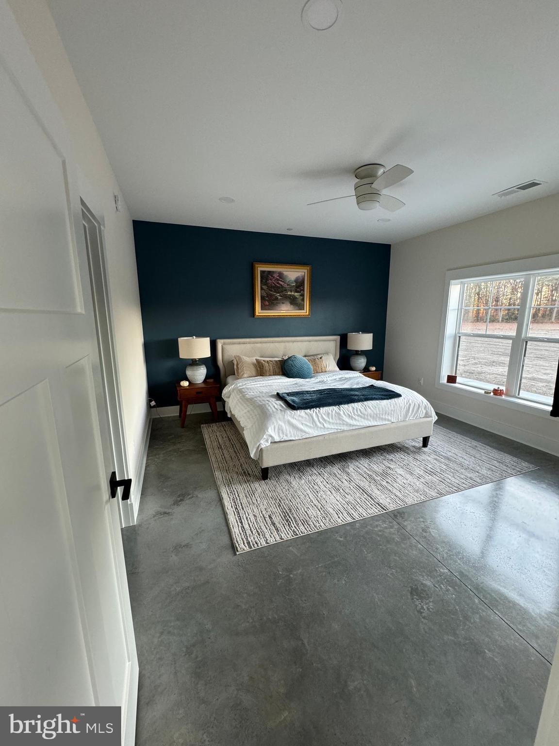 26067 Goldsboro Road Goldsboro, MD 21636 - Photo 17 of 21 a spacious bedroom with a bed and window