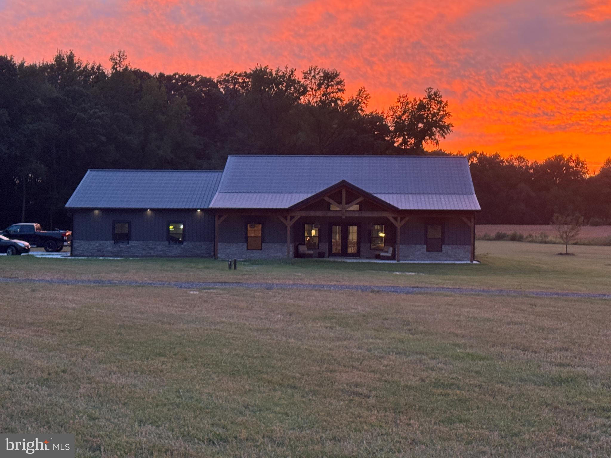 26067 Goldsboro Road Goldsboro, MD 21636 - Photo 2 of 21 a front view of a house with a yard