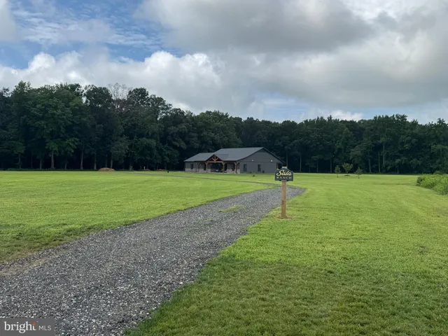a view of a golf course with a yard