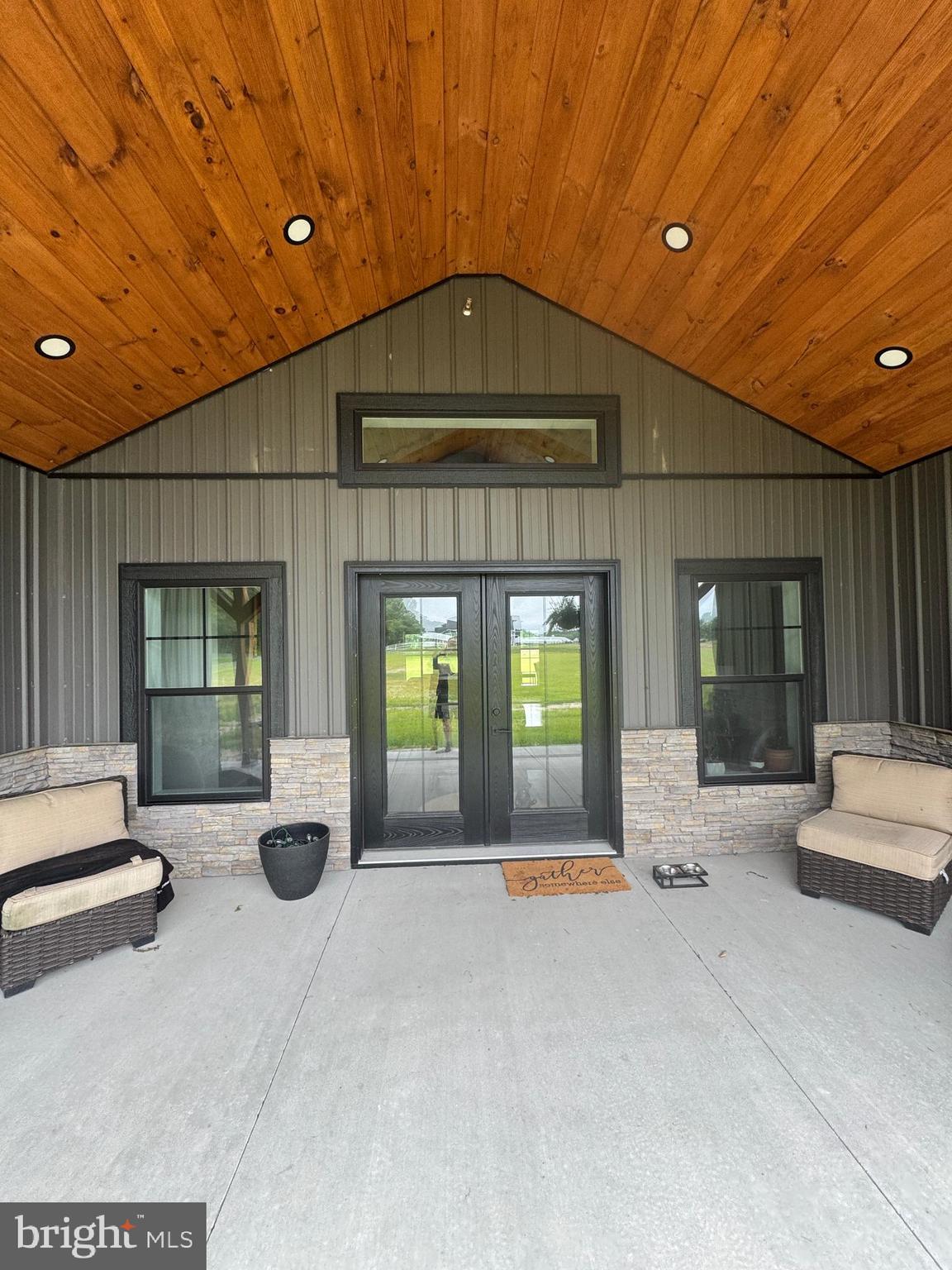 26067 Goldsboro Road Goldsboro, MD 21636 - Photo 9 of 21 a living room with furniture and large windows