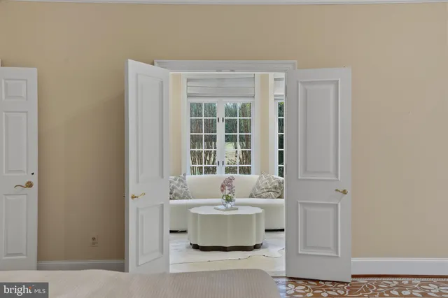 front view of a building with a tree