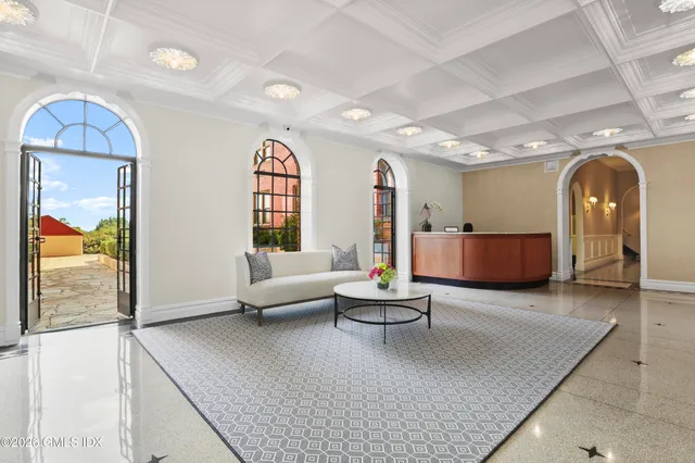 a bench sitting in front of a building