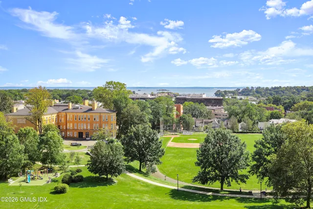 a front view of a building with garden