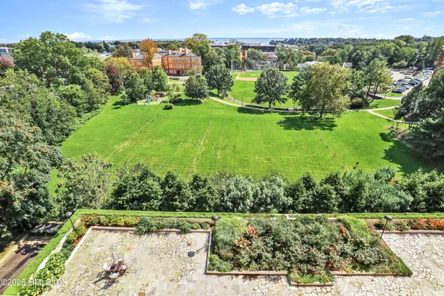 front view of a building with a yard