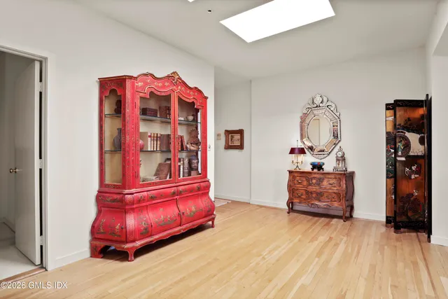 a bedroom with a bed and furniture