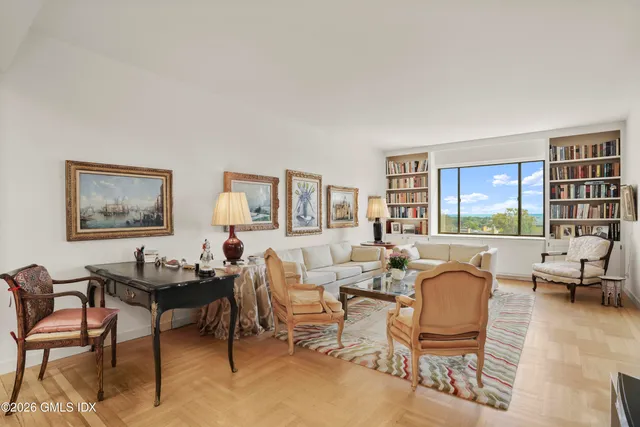 a living room with furniture and a window