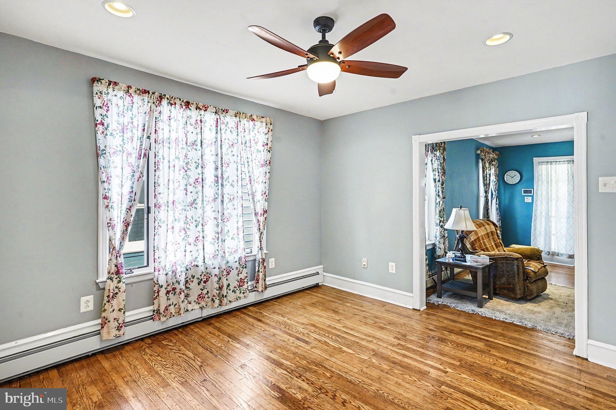 4031 Vernon Road Drexel Hill, PA 19026 - Photo 13 of 38 a living room with furniture and a large window